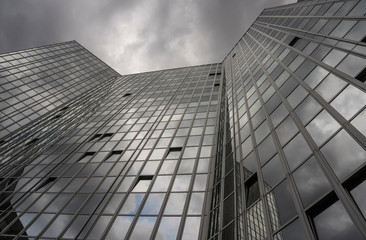 Fototapeta premium modern office building with storm clouds