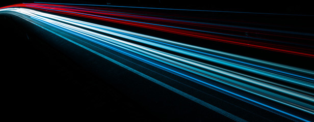 Fototapeta na wymiar colorful lights of cars at night
