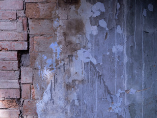 Texture of old wood, cement and bricks. Ragged wall.