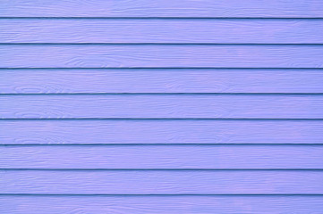 Obraz premium Wall panel paint purple,blue color synthetic wooden plank texture surface background. Outdoor panel wood nature pattern or abstract backdrop vintage horizontal lines ,summer design and decoration.