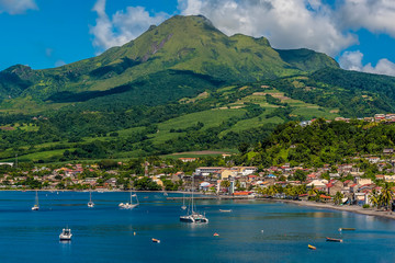 A view towards the town of Saint Pierre and the volcano, Mount Pelee in Martinique - obrazy, fototapety, plakaty