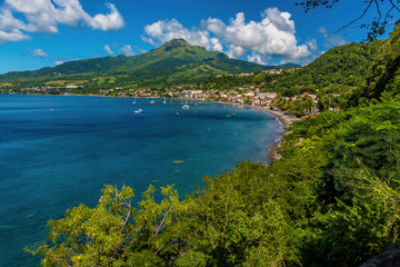 A panorama view along the coast towards the town of Saint Pierre and the volcano, Mount Pelee in...