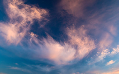 Plumose clouds on sunset, nature background