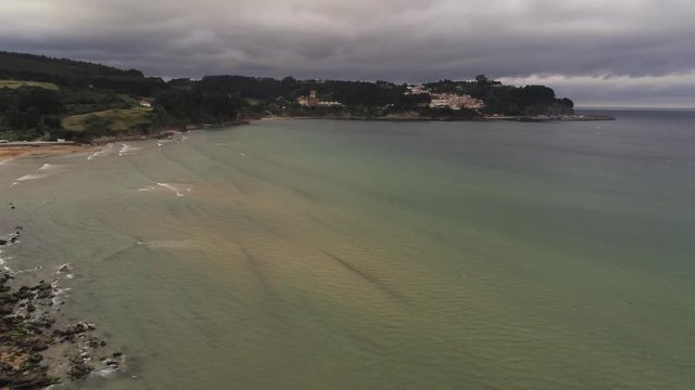 Beautiful beach in Lastres. Asturias. Colunga, Spain. Aerial Drone Footage