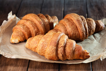croissant on wooden table