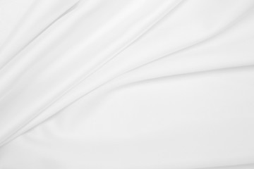 Naklejka premium Smooth elegant white silk or satin luxury cloth texture as wedding background. Luxurious background design