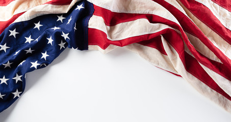 American flags against white background. Flat lay with copy space. Happy Labor Day concept.
