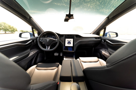 The interior of a full-sized, all-electric, luxury, crossover SUV Tesla Model X. Black and grey.