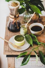 Coffee and dessert setup. Green matcha cheesecake and brewed pour-over coffee in glass flask on rustic wooden kitchen counter, top view. Healthy, vegan, vegetarian, low calorie food concept
