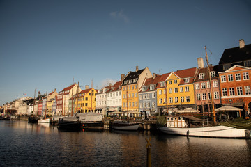 Fototapeta na wymiar Facades of bright colored houses at Nyhavn (Copenhagen, DK)