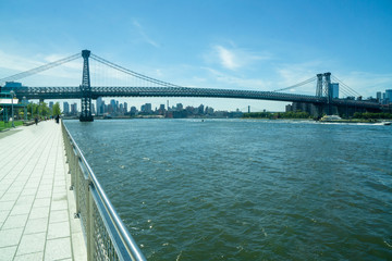 Fototapeta na wymiar Brooklyn, NY / USA - 8/20/20: landscape view Williamsburg Bridge, seen from the Brooklyn side of the East River.