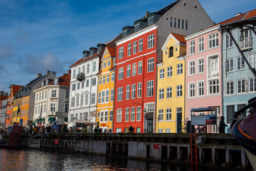 Facades of bright colored houses at Nyhavn (Copenhagen, DK)