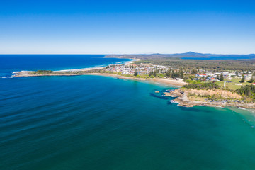 Yamba main beach and ocean pool bath aerial photograph on blue sky sunny day