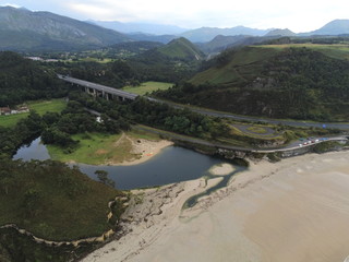Naklejka na ściany i meble Asturias. Beautiful beach of San Antolin in Asturias,Spain. Aerial Drone Photo