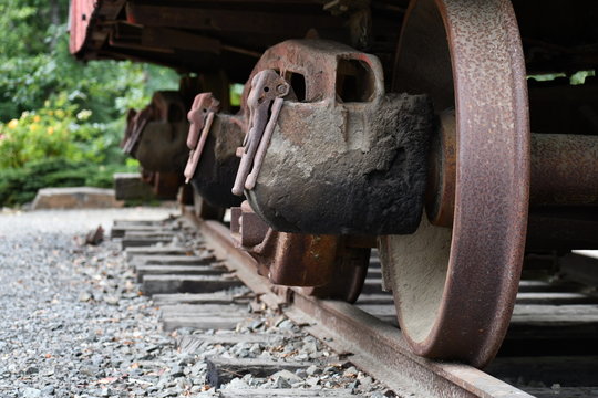 Train car wheels and track.