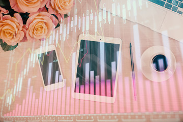 Multi exposure of forex graph hologram over desktop with phone. Top view. Mobile trade platform concept.