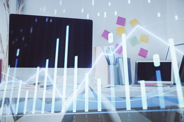 Double exposure of financial graph drawing and office interior background. Concept of stock market.
