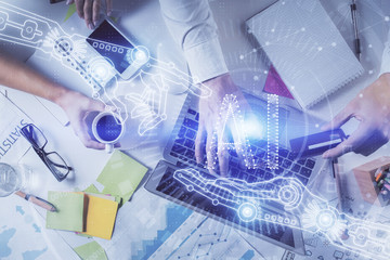 Double exposure of man's hands typing over computer keyboard and data theme hologram drawing. Top view. Technology concept.