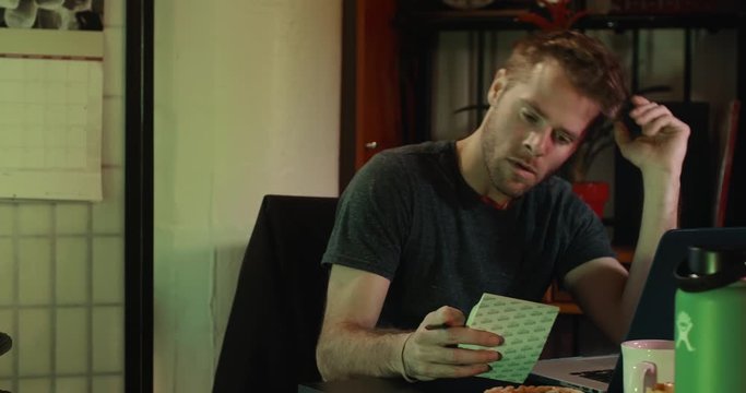 White Man Writer Mad Frustrated Upset Slams Laptop Shut Messy Desk Writer's Block