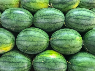 Arranging watermelons into piles
