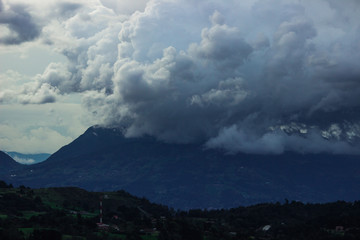 Mountain covered by clouds