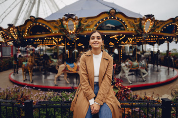 girl walking through the amusement park in paris