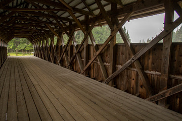 Wooden pegs and other construction techniques from history live on in New England's covered bridges.