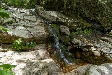 The Bully Brook Cascade provides a series of waterfalls and pools along the side of the Long Trail on the North side of White Rocks Mountain