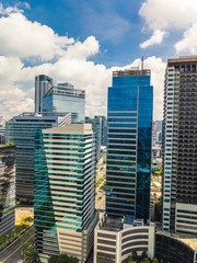 The skyline of Bonifacio Global city in Metro Manila. Drone shot of modern contemporary office highrises.