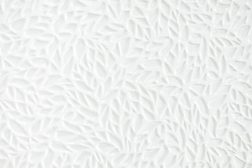 White tiles with leaf texture for texture background and copy space.