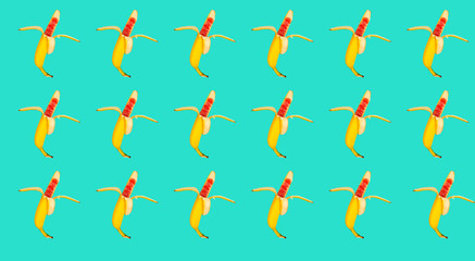 Peeled banana with red marmalade instead of fruit on a blue background.