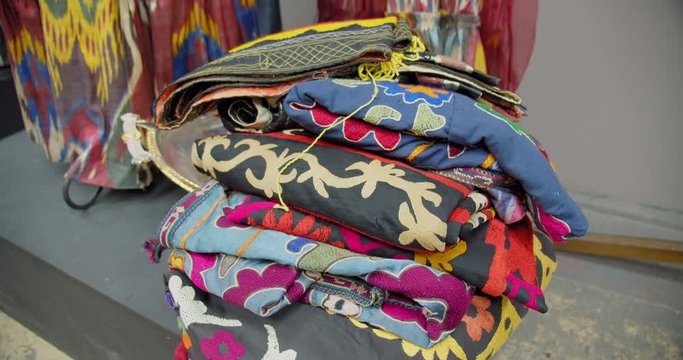 A bunch of embroidery at the Silk Road store, Uzbekistan. Central Asia.