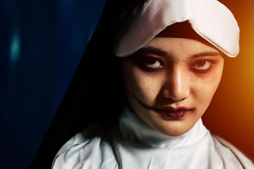 evil woman nun scare on the dark room,Halloween concept.