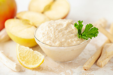 Apple horse-radish sauce for meat in jar and ingredients. Austrian dish Apfelkren