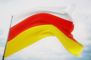 Waving flags of the world - flag of South Ossetia. Shot with a shallow depth of field, selective focus. 3D illustration.