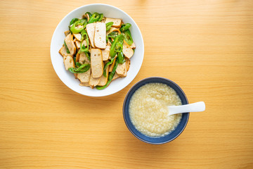 Chinese food millet porridge and green pepper sauteed dry