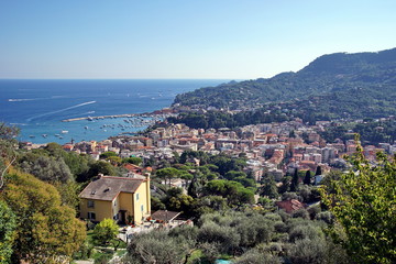 Fototapeta na wymiar Beautiful view to Santa Margherita Ligure city, blue sky and sea in Italy