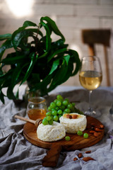 Farmer camembert cheese on the cutting board. selective focus