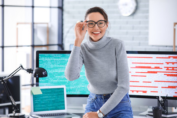 Portrait of female programmer in office