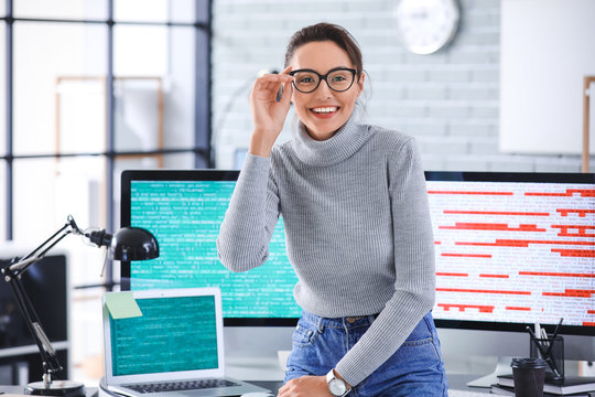 Portrait of female programmer in office