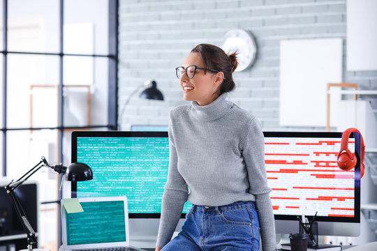 Portrait of female programmer in office