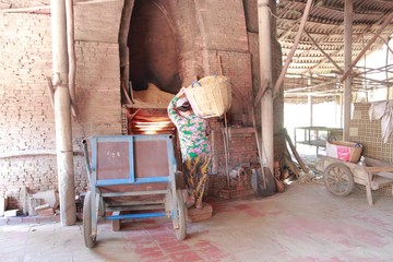 Photo of traditional craft village: normal life is lined with bricks in brick kilns (Vietnam)