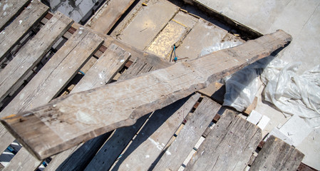 Wooden boards at a house construction site.