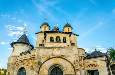 Fototapeta na wymiar Facade and bell tower of the ancient Zvirinets monastery in Kiev, Ukraine