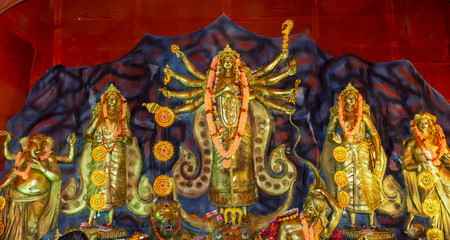 Durga Puja or Durgotsava,is an annual Hindu festival celebrated mainly in West Bengal,Indian.Durga is Goddess riding a lion with many arms each carrying weapon and defeating evil power of Mahishasura.
