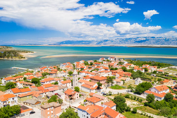 Naklejka premium Aerial view of town of Nin with seascape and Velebit mountain in background, Dalmatia, Croatia