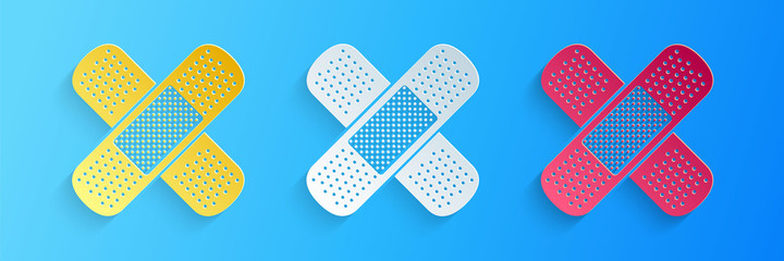Paper cut Set Bandage plaster icon isolated on blue background. Medical plaster, adhesive bandage, flexible fabric bandage. Paper art style. Vector.