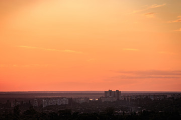 Landscape of the outskirts of the city in the sunset or dawn sky