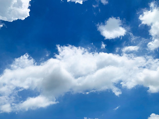Beautiful blue sky with white clouds for background. - 373423378