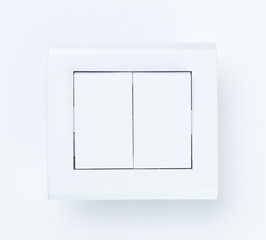 White wall two-button switch on a white background.